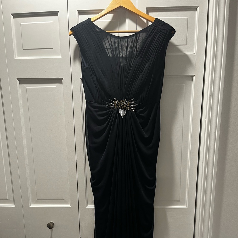 Size 6 gown. Navy blue. Floor length.